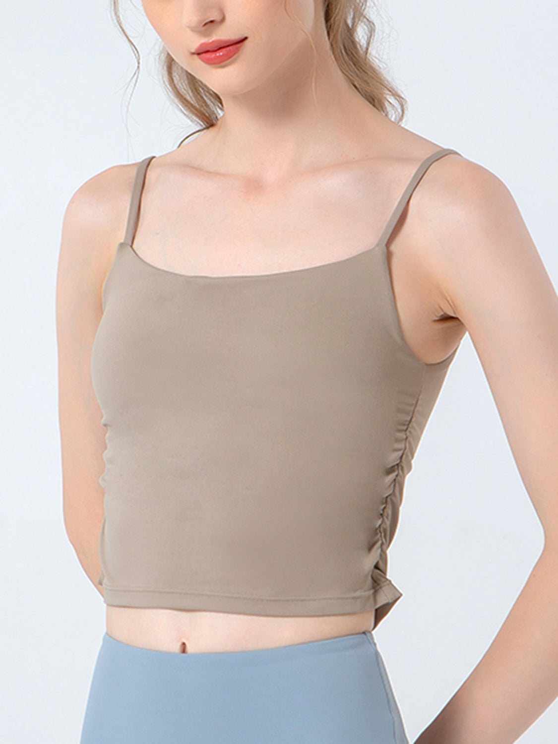 Beige tank crop top with side ruching detail and spaghetti straps