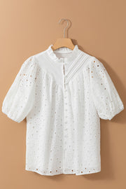 White eyelet puff-sleeve blouse with stand collar and button front