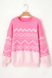 Pink acrylic knit sweater with geometric colorblock pattern, crewneck, and ribbed cuffs.