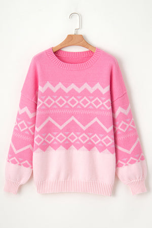 Pink acrylic knit sweater with geometric colorblock pattern, crewneck, and ribbed cuffs.