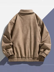 Khaki bomber jacket with classic collar, elastic cuffs, and embroidered detail on sleeve.