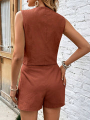 Ochre cotton tailored vest and pleated shorts set, shown from the back.