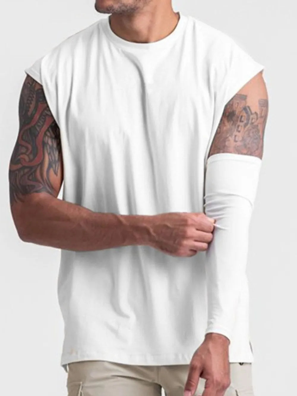 White sleeveless performance tee with a crew neck and athletic cut.