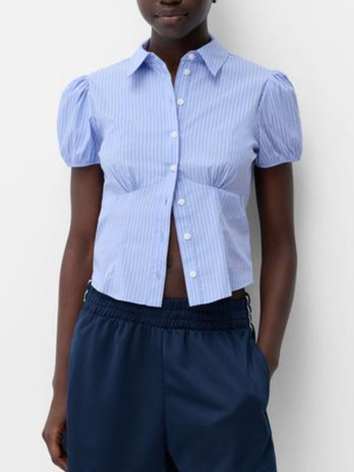 Light blue pinstripe puff sleeve button-up shirt with a fitted waist
