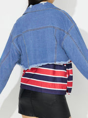 Medium wash denim trucker jacket with raw hem and collar.