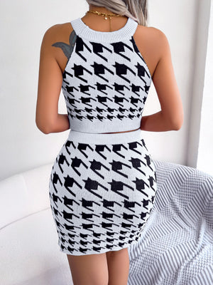 Houndstooth knit halter crop top and mini skirt set in white and black.