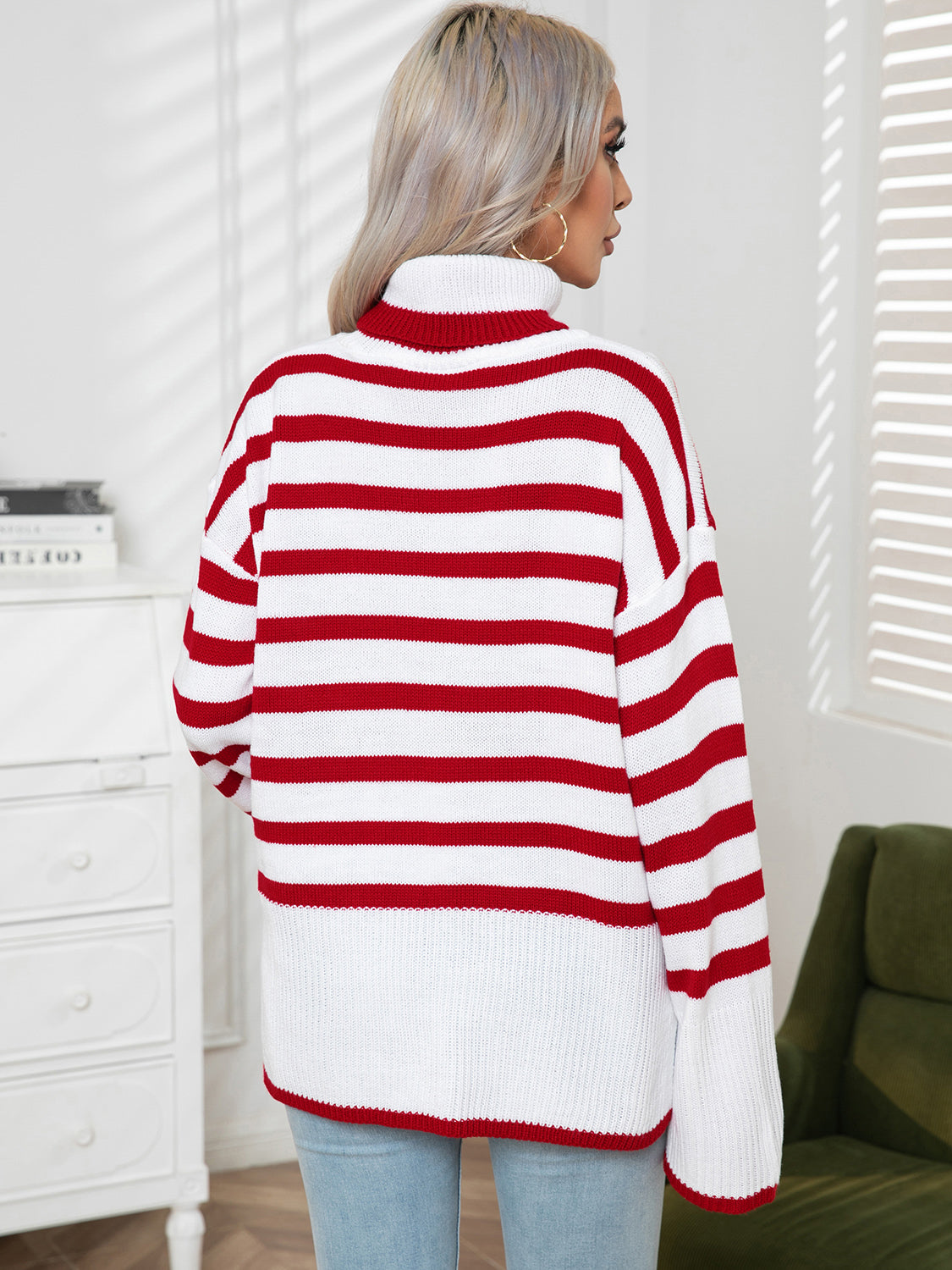 Flared sleeve striped turtleneck knit sweater in red and white acrylic.