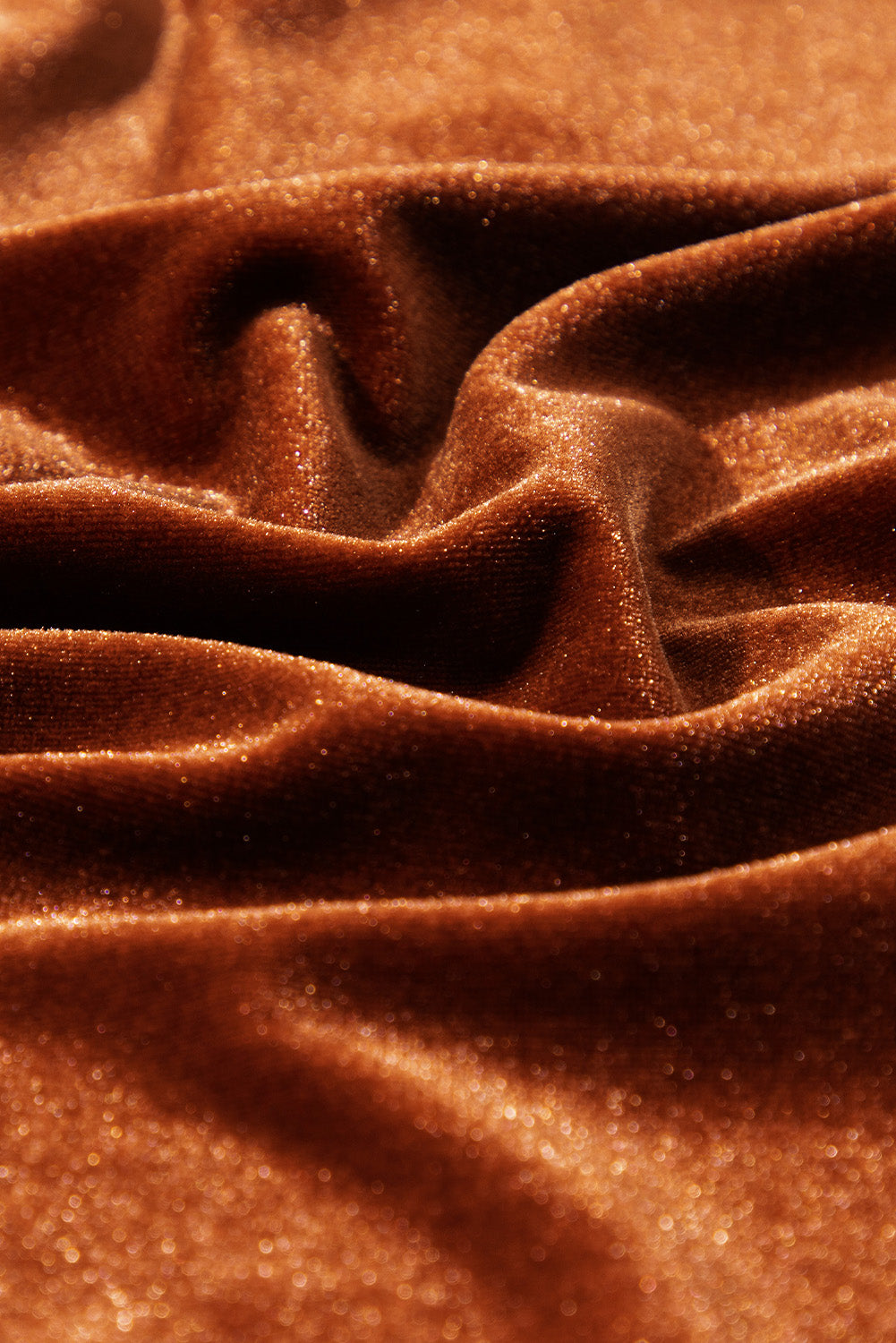 Brown velvet blouse with subtle sparkle and gathered texture detail