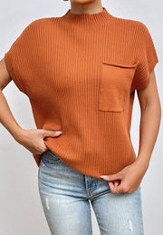 Caramel ribbed knit mock neck top with short sleeves and a chest pocket.