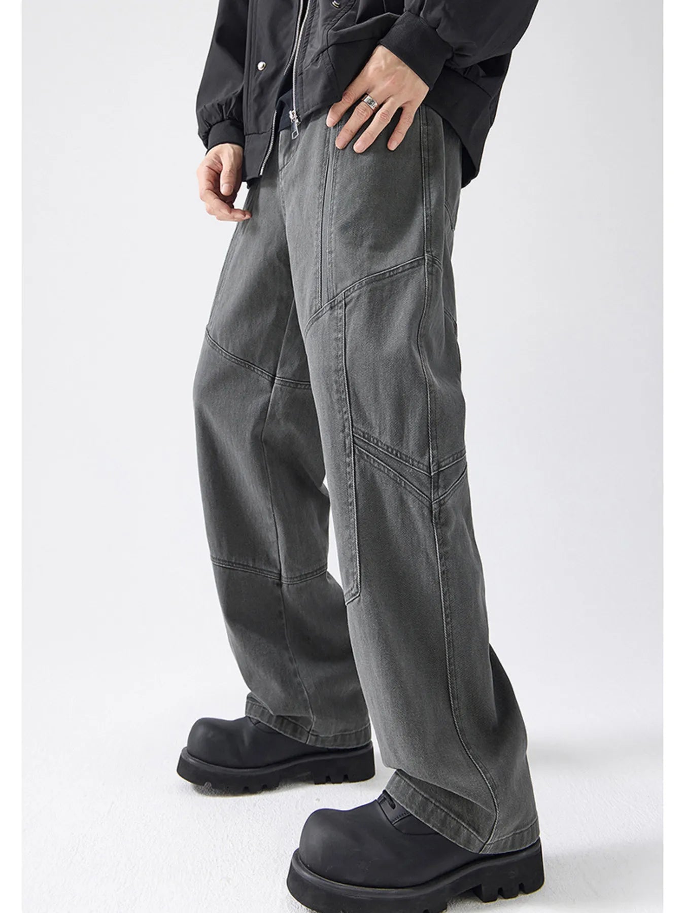Gray cotton wide-leg trousers with panel stitching detail.
