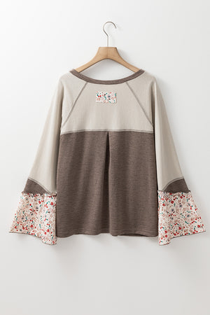 Floral bell sleeve henley top in mocha with contrast floral print cuffs and yoke detail.