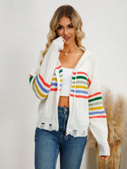 White knit zip-up hoodie with rainbow stripes and distressed details.