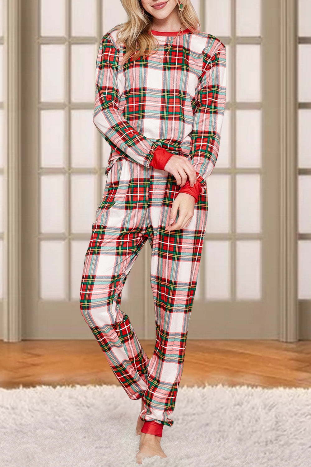 Festive plaid loungewear set in red with white and green checks, featuring red trim on cuffs and ankles.