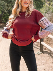 Plaid Colorblock Patchwork Sleeve Sweatshirt in Burgundy, close-up detail