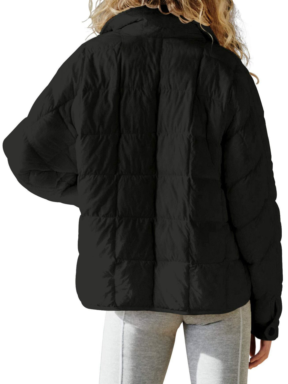 Black quilted bomber jacket with stand collar and button cuff detail