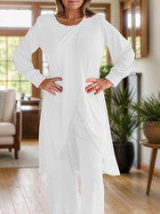 White draped overlay palazzo co-ord set with long sleeves and wide-leg pants.