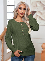 Cable knit henley sweater in Matcha Green with button detail and diamond pattern.