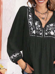 Black embroidered yoke blouse with gathered bodice and tie neck
