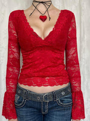 Deep red lace surplice blouse with bell sleeves and scalloped trim.