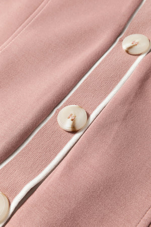 Dusty pink cardigan with varsity trim and button details