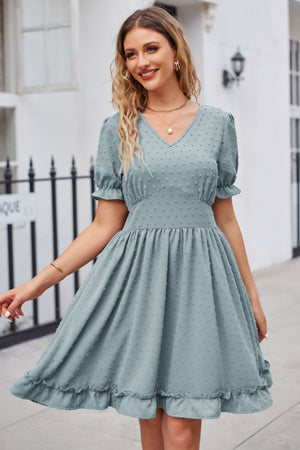 Teal textured dot puff sleeve fit-and-flare dress with ruffled hem and V-neck