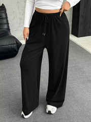 Black drawstring wide-leg maternity pants with a comfortable fit.