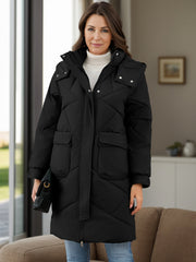 Black diamond quilted hooded puffer coat with snap closure and two flap pockets.