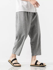 Men's light gray relaxed fit cropped sweatpants with elastic waist