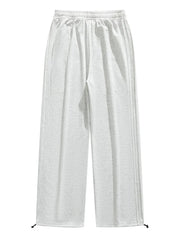 Lightweight wide-leg men's sweatpants in light gray with drawstring and side stripe detail.