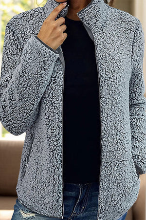 Teddy fleece zip-up jacket in dark gray with a stand-up collar and zipper closure.