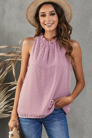 Textured halter neck tank top in dusty pink with a ruffled neckline.
