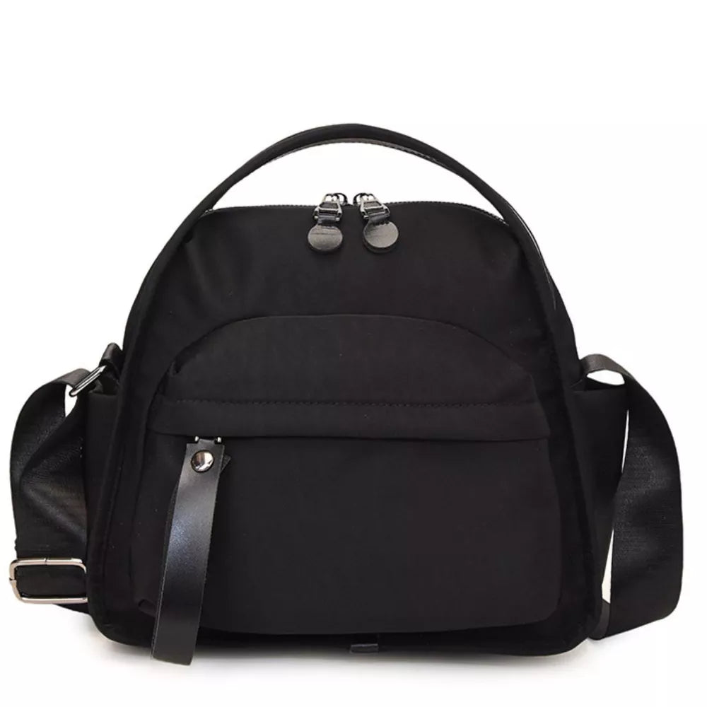 Black nylon chest bag with adjustable strap and multiple pockets.