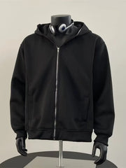 Black zip-up hoodie with a comfortable fit and zippered pockets.