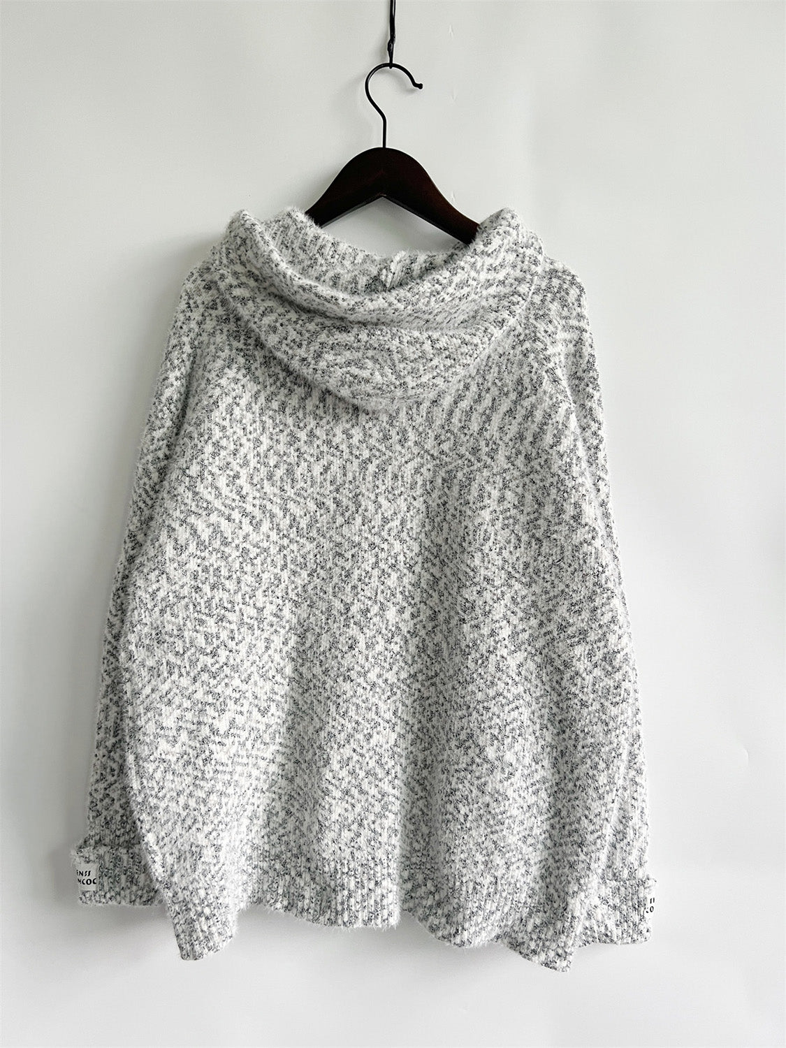 Speckled knit relaxed zip-up hoodie in white with charcoal flecks, acrylic.