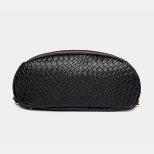 Black woven faux leather convertible backpack with brown trim.