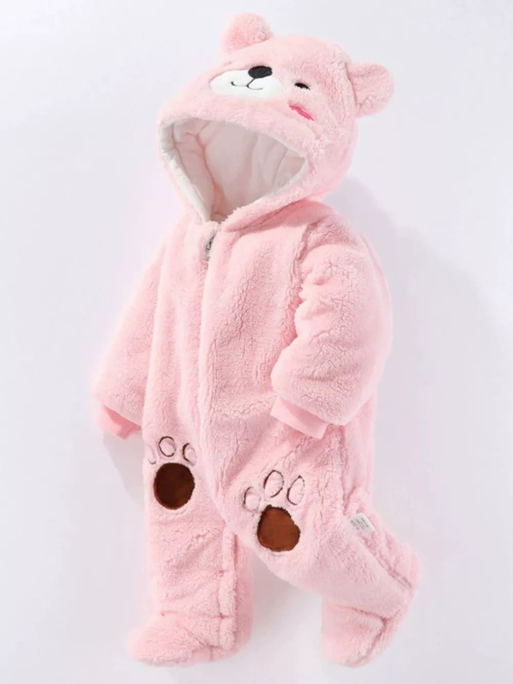 Pink fleece baby snowsuit with bear hood and paw print details.