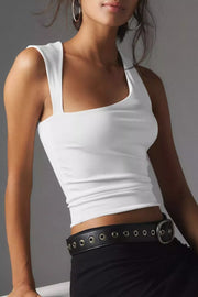 White asymmetrical one-shoulder cropped tank top with a square neckline.