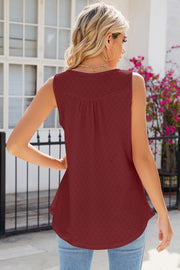 Rust eyelet tank top with gathered detail at the neckline and button front.