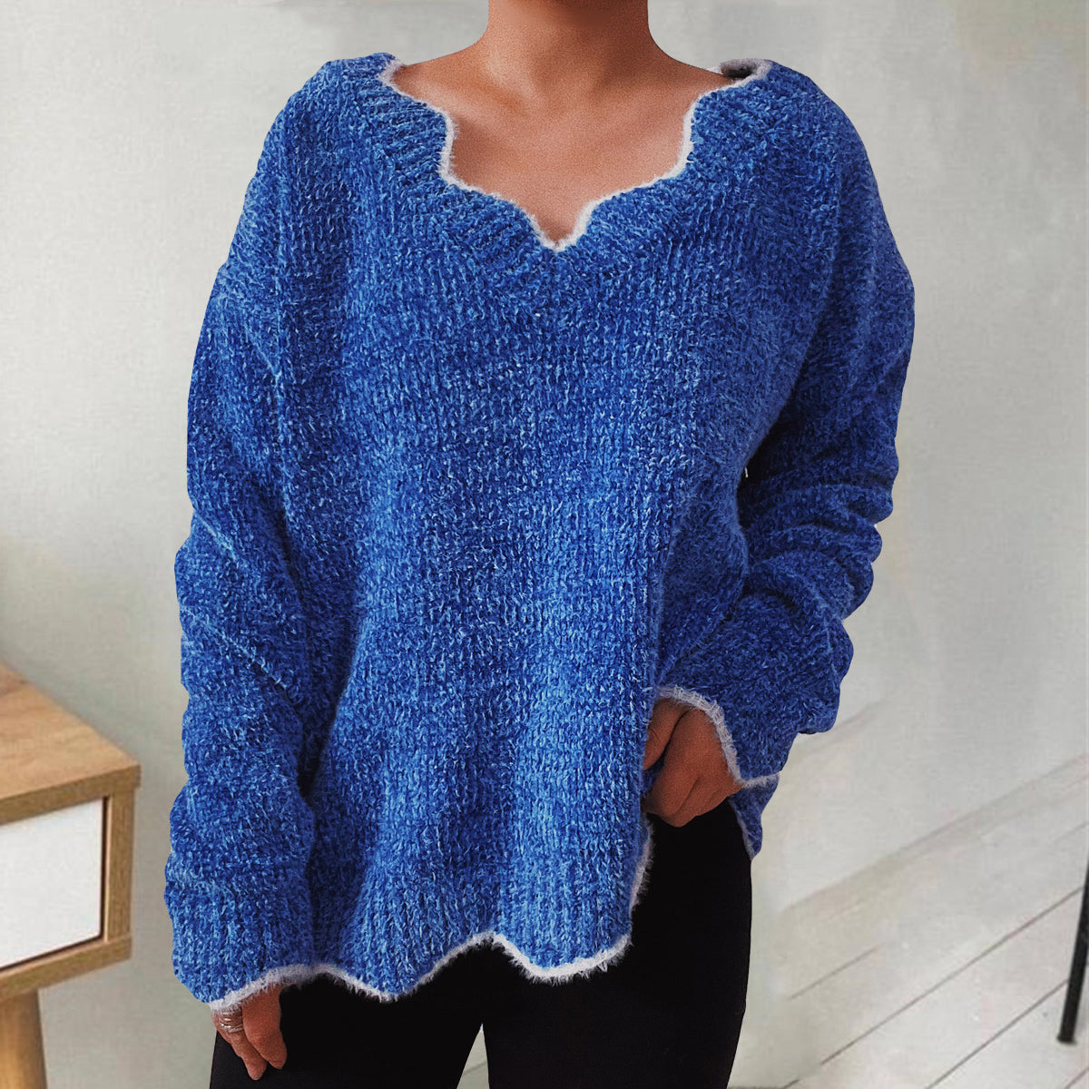 Royal blue knit sweater with scalloped trim and V-neck