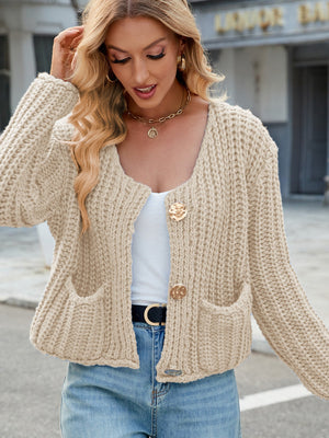 Beige chunky knit cardigan with gold buttons and pockets