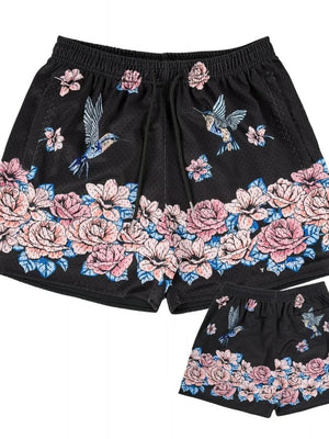 Black mesh athletic shorts with floral and hummingbird print