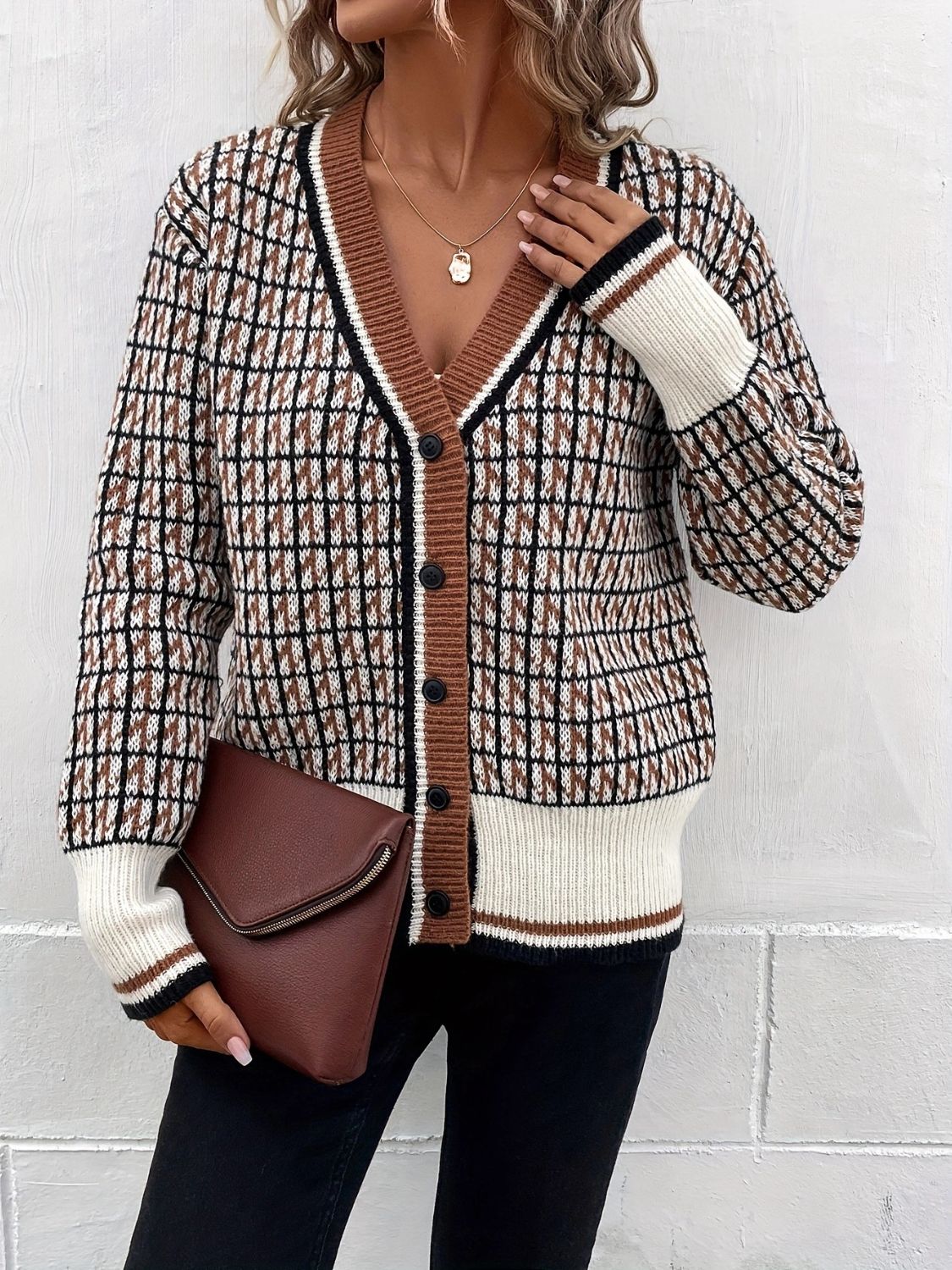 Geometric knit cardigan in caramel with button front and contrast trim.