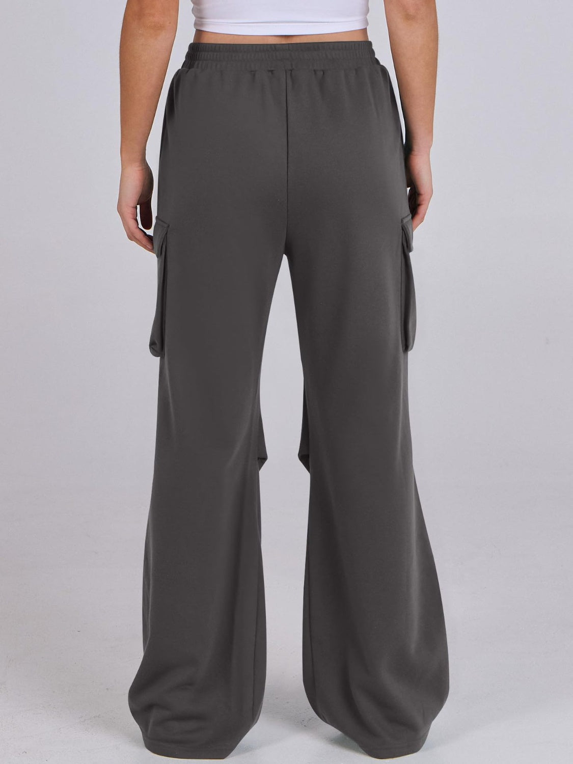 Dark Gray cargo pocket sweatpants with wide legs and a draped fit.