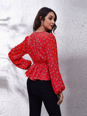 Red floral peplum blouse with gathered waist and puff sleeves