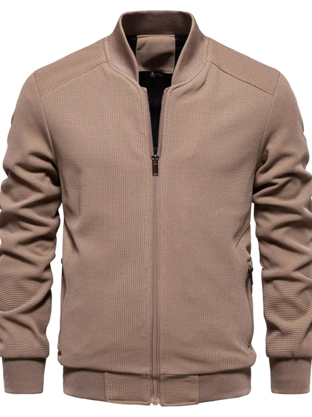 Taupe textured knit bomber jacket with faux shearling lining and zip closure.