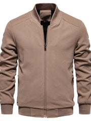 Taupe textured knit bomber jacket with faux shearling lining and zip closure.
