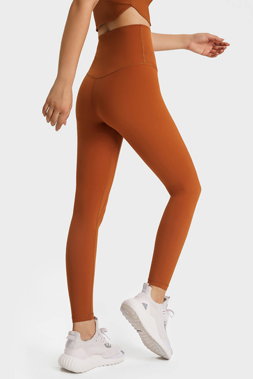 SoftLux high rise leggings in a warm brown color with a seamless waistband and full length.