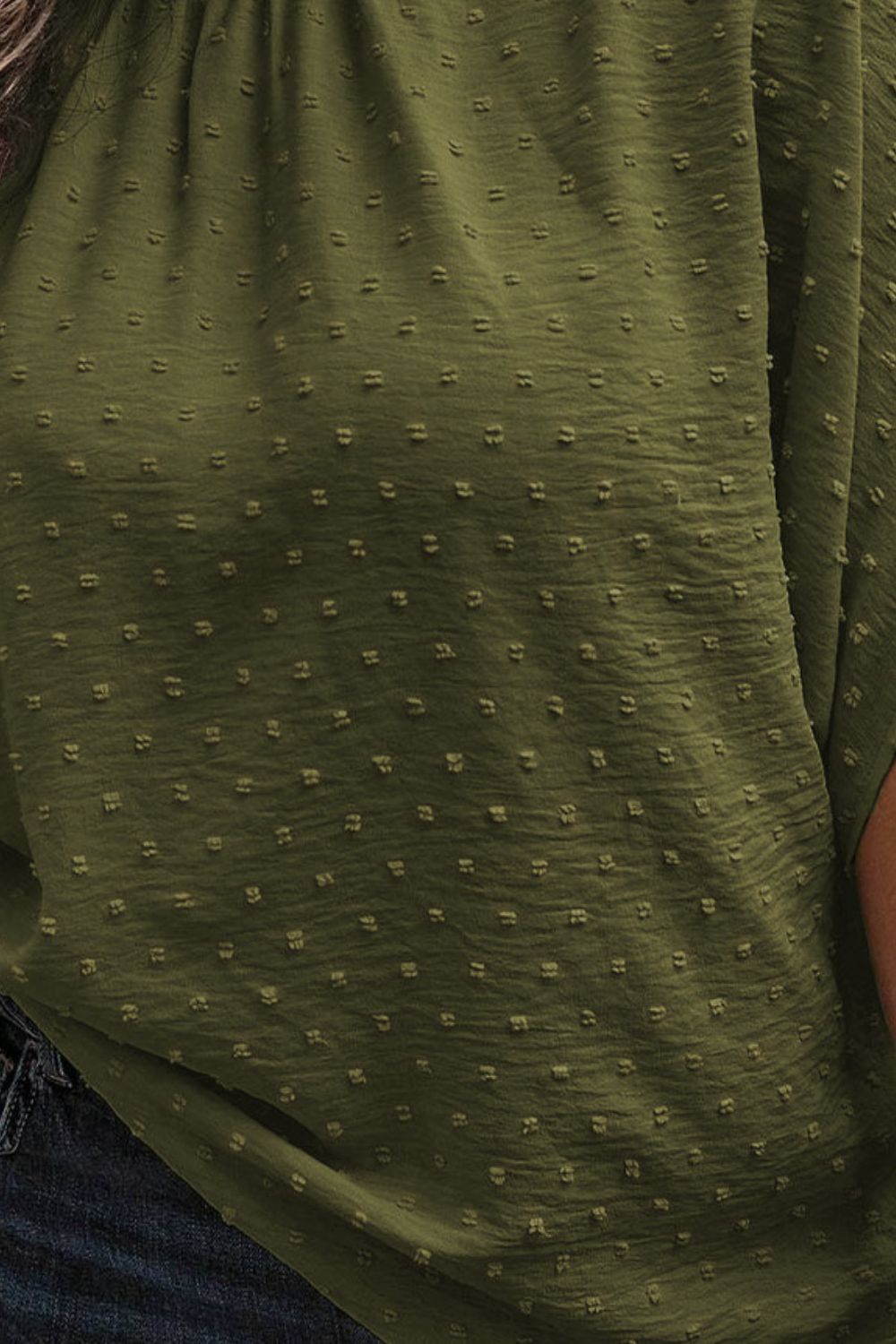 Matcha green Swiss dot blouse with textured fabric and short sleeves