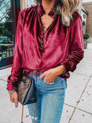 Burgundy velvet blouse with mandarin collar and button detail