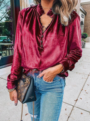 Burgundy velvet blouse with mandarin collar and button detail